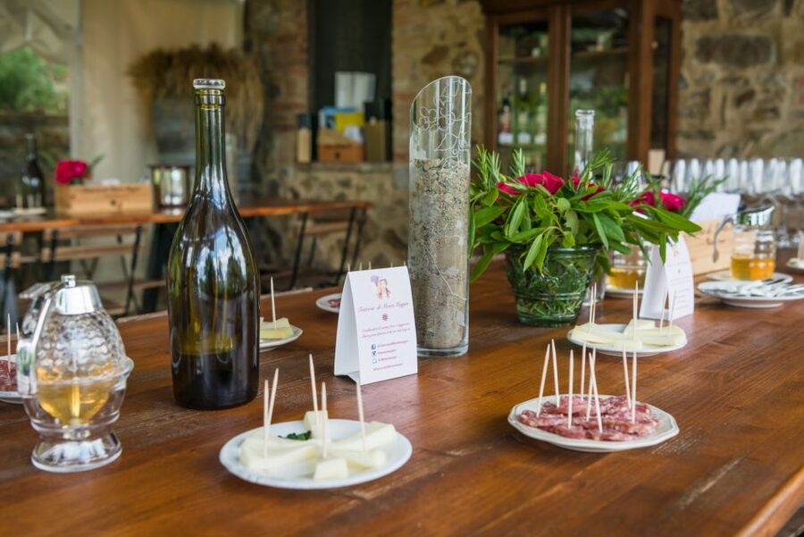 Total Immersion Wine Tour in Chianti - The tasting room finale: five estate wines plus olive oil, cheese, and salami
