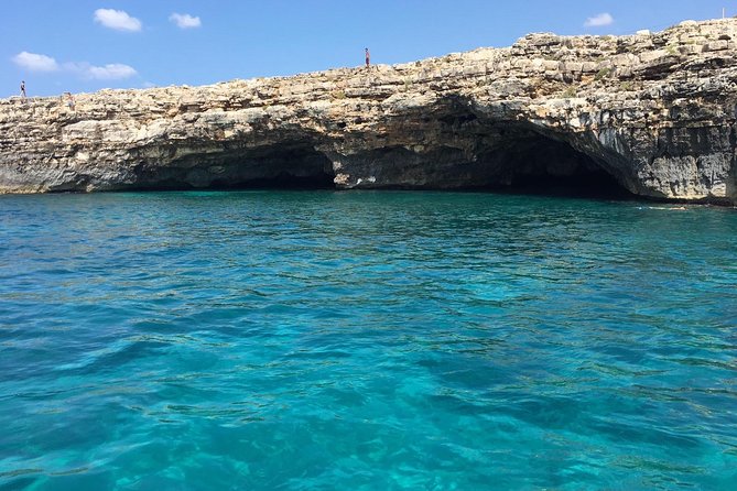 Tour 3h and half visit of all the caves, bathroom stop and aperitif - Felloniche Spiaggia: the emerald-water swim break