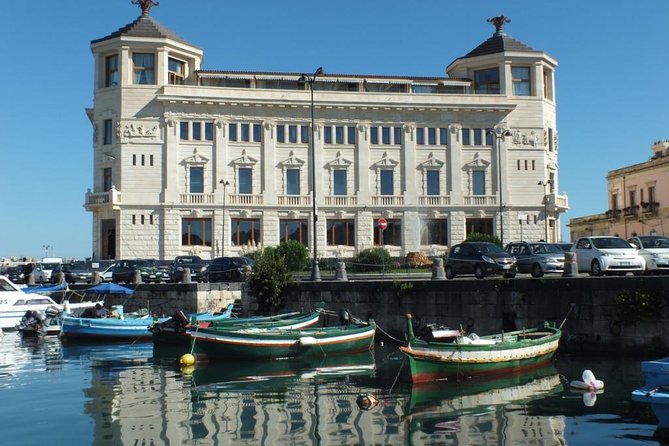 Tour of the island of Ortigia and exploration of sea caves with baths. - What to Bring for the Swim and Comfort on Board