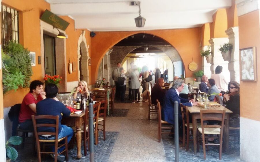 Verona: History and Hidden Gems Guided Walking Tour - Piazza delle Erbe: the market square that still feels alive