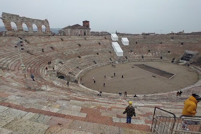 Verona Small Group Walking Tour with Cable Car and Arena Tickets - Piazza delle Erbe: market energy, Roman roots, and optional tasting